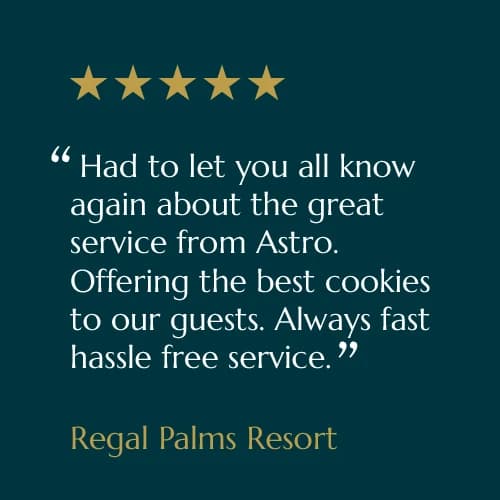 Five-star customer review card from Regal Palms Resort